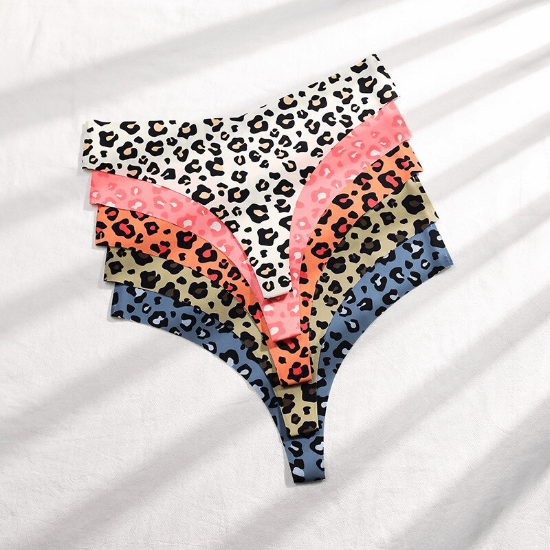 Stack of leopard print T-shaped panties in various colors on white background, showcasing seamless design and vibrant patterns for women.